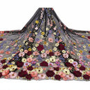 Floral embroidered fabric with colorful flowers on a dark background
