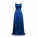 Blue evening gown with a slit on a white background