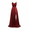 Red satin evening gown with a high slit on a white background