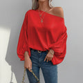 Women's off-shoulder satin blouse with elegant design